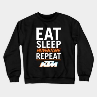 Eat Sleep Adventure Repeat on a KTM Crewneck Sweatshirt